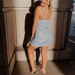 Light blue rhinestone short cut dress.